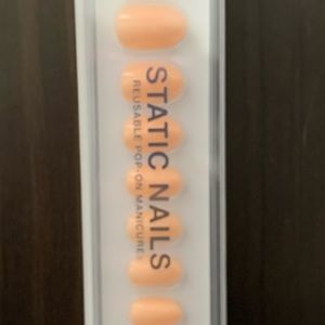 New, never opened. Rounded shape. Creamsicle color
